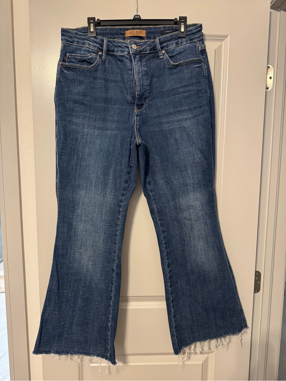 Judy Blue Medium Blue Flare Jeans with Raw Fringe Hem